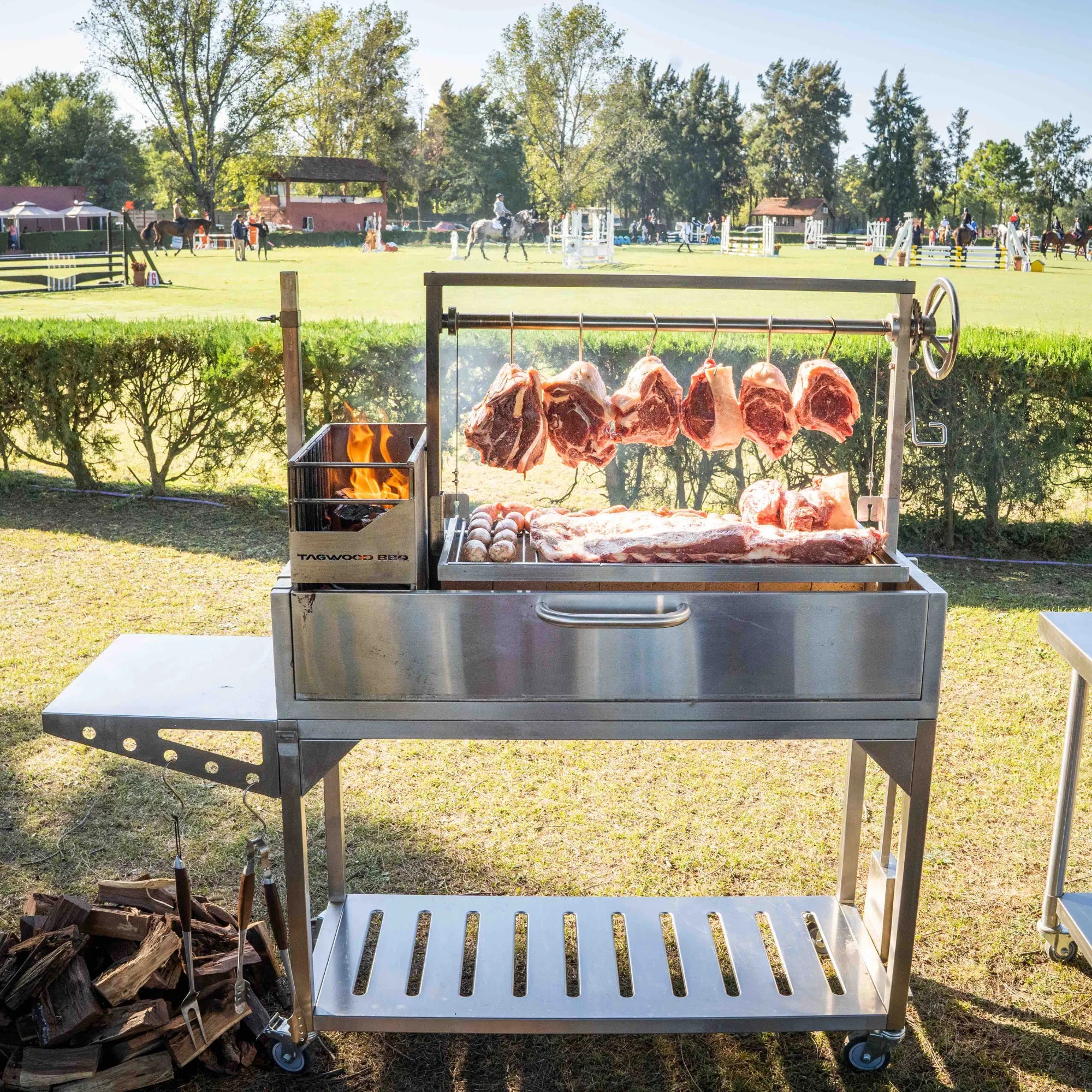 Tagwood BBQ03SS Freestanding Santa Maria Argentine Grill With 6" Casters | Novaselectes