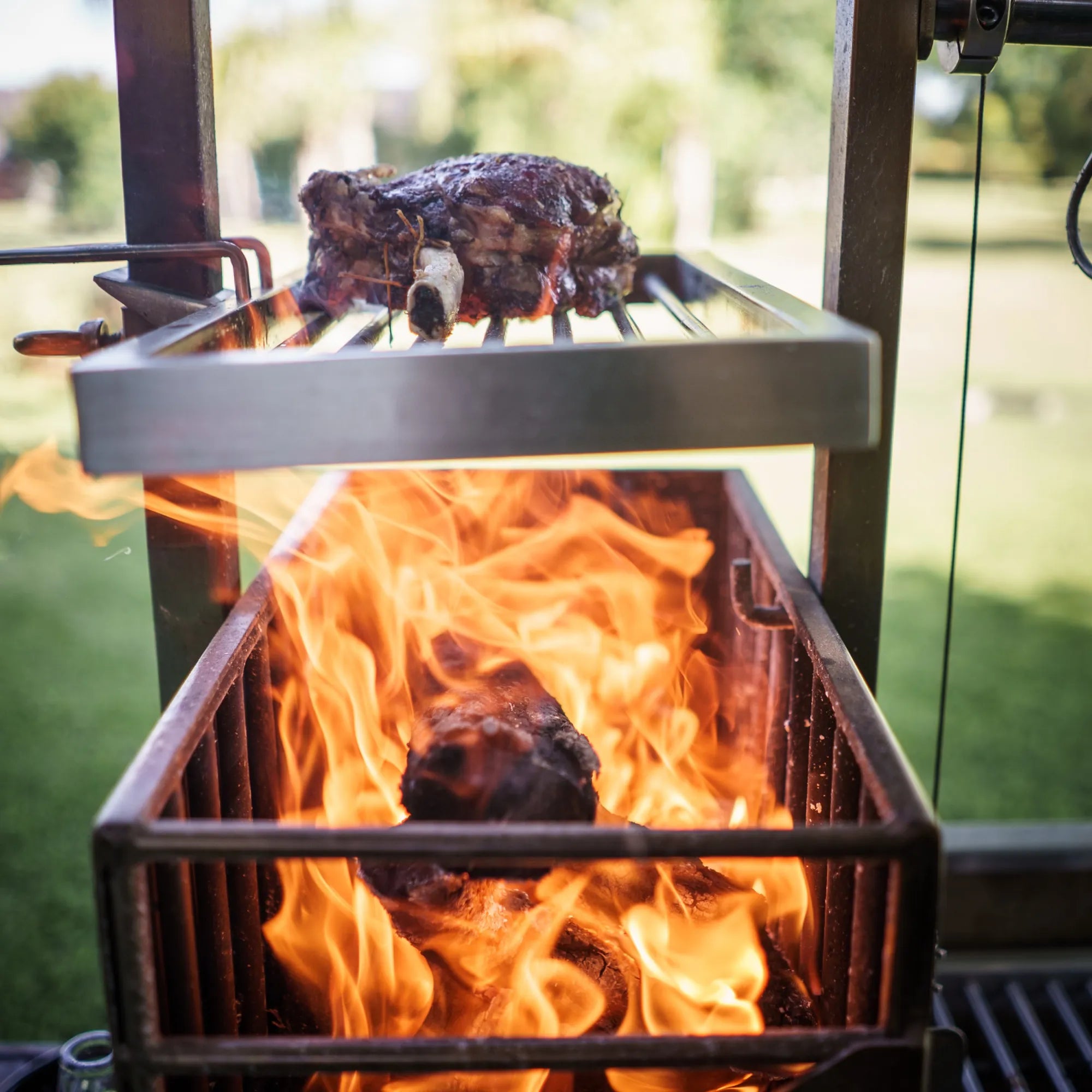 Tagwood BBQ03SS Freestanding Santa Maria Argentine Grill With 6" Casters | Novaselectes
