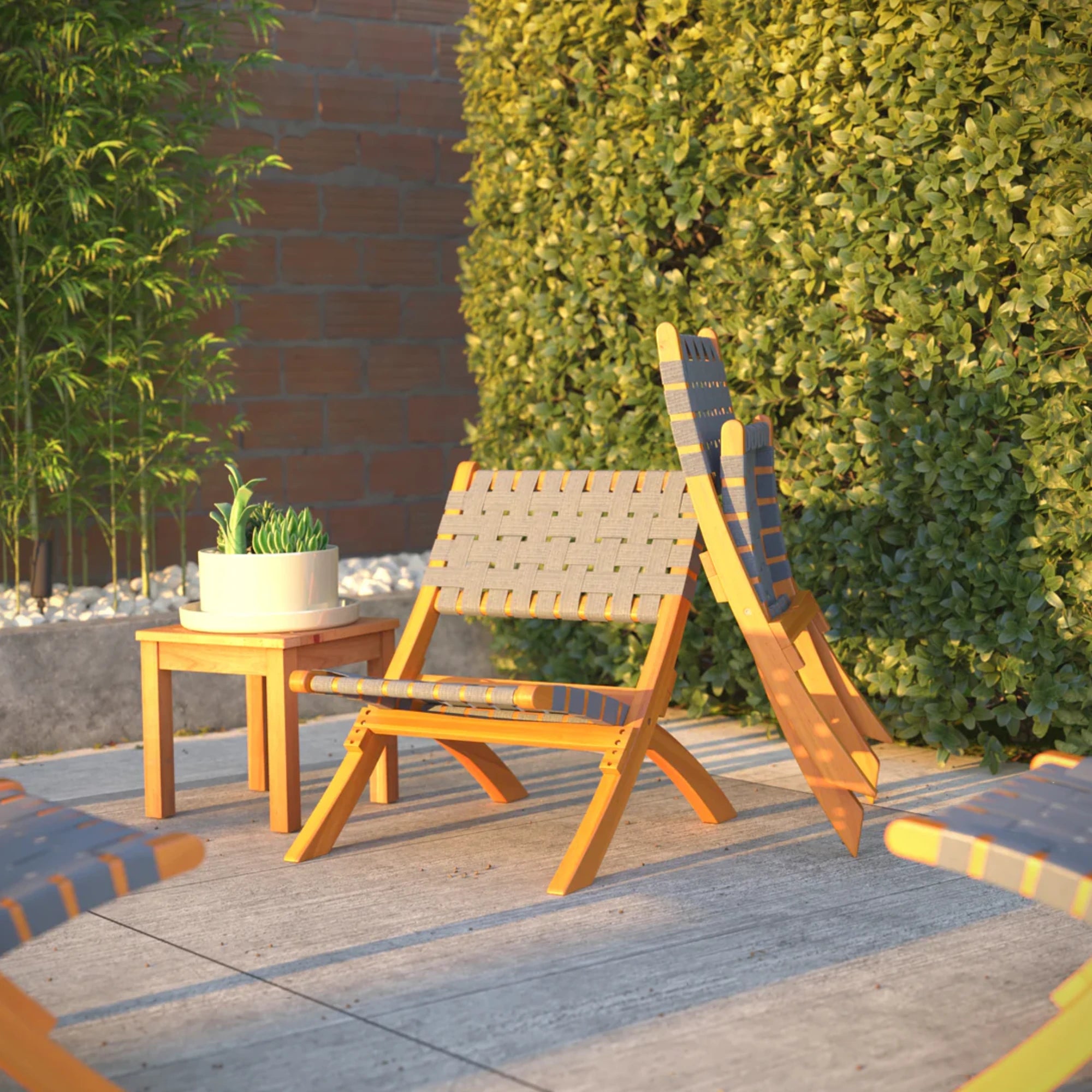 Well Traveled Living Sava Folding Chair in Warm Gray Webbing | Novaselectes