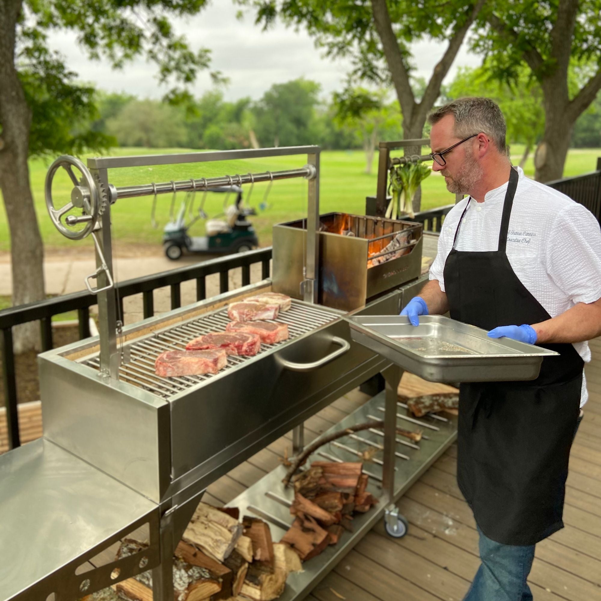 Tagwood BBQ04SS BBQ Double Argentine Santa Maria Freestanding Charcoal Grill | Novaselectes