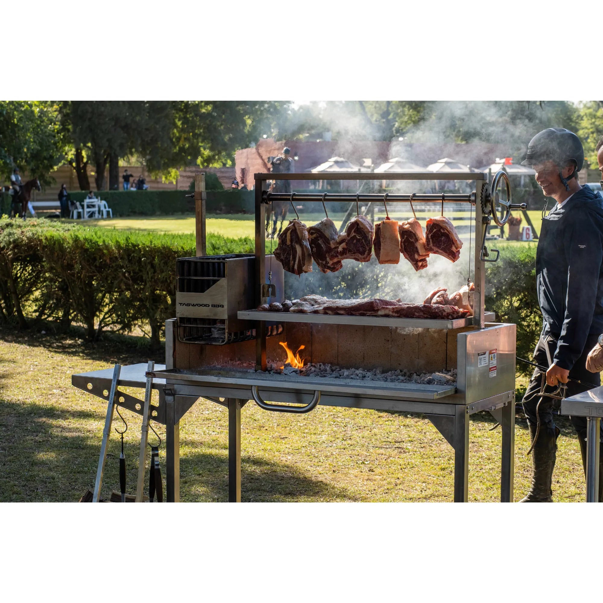 Tagwood BBQ03SS Freestanding Santa Maria Argentine Grill With 6" Casters | Novaselectes